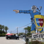 Shields Date Garden sign is a huge knight pointing at the store, since 1950s.