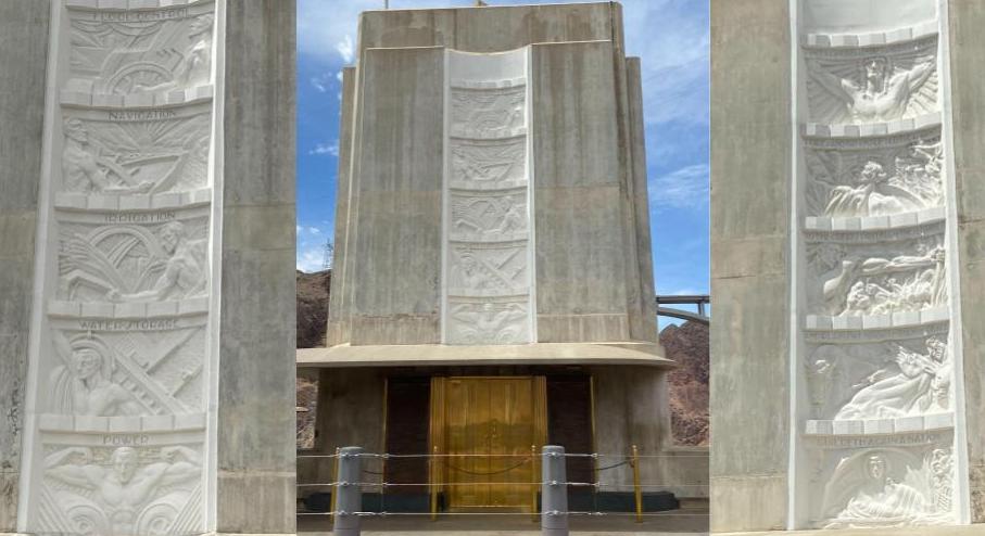 Bas-relief panels over golden elevators