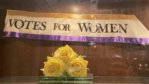 Banner and yellow roses