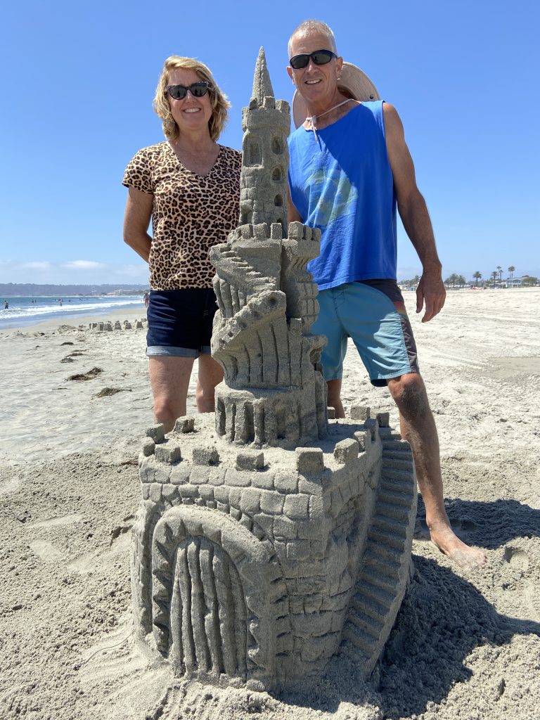 Sandcastle Building Lesson final product with the proud sculptors